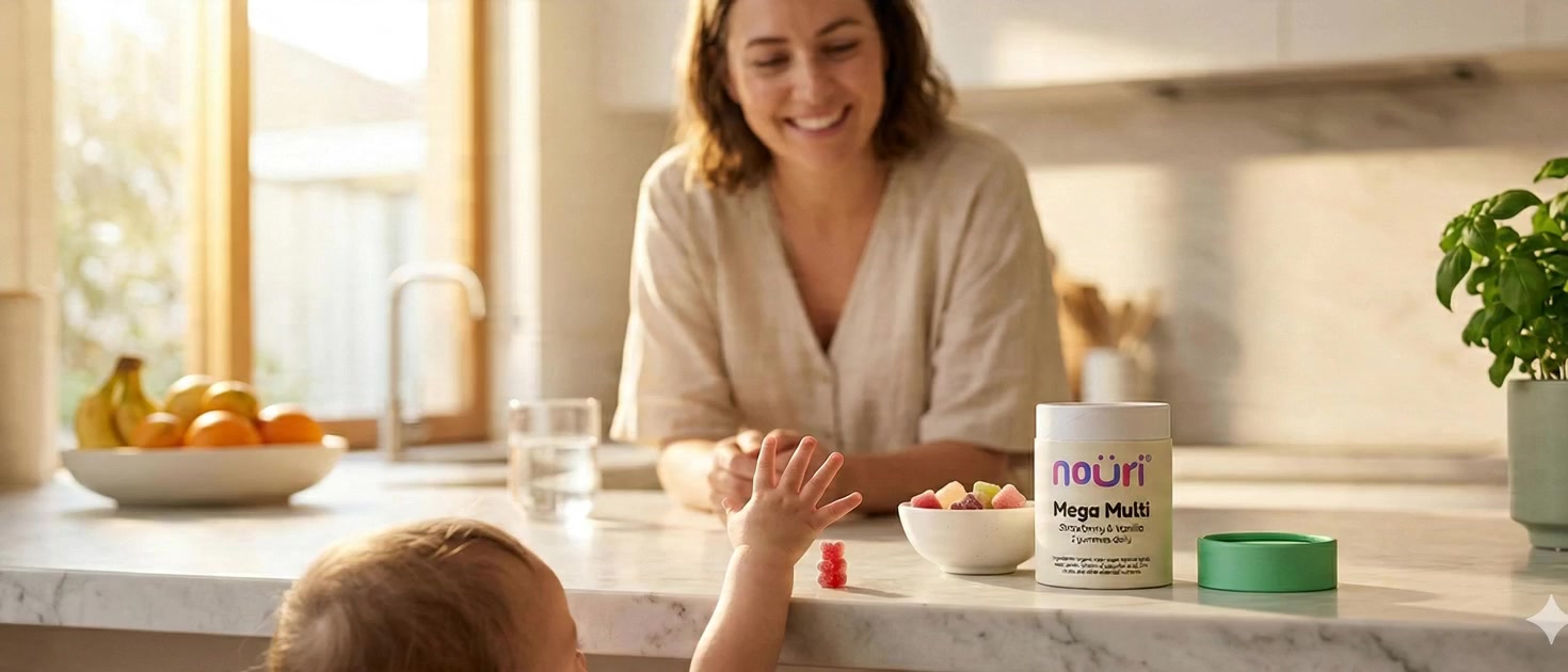 Mum smiling while child reaches for a Nouri gummy